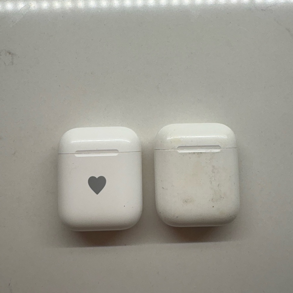 2 sets of White Wireless Apple AirPods